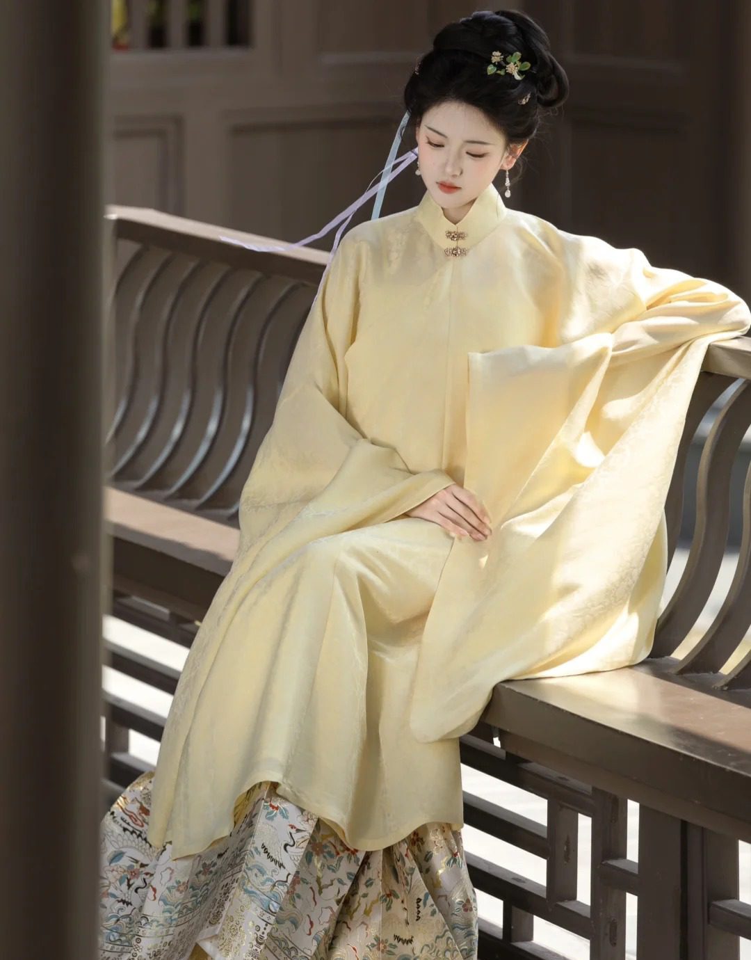 For an image of a woman in a Ma Mian Qun: "A woman wearing a beautiful Ming - dynasty Ma Mian Qun, with its characteristic pleats and elegant pattern